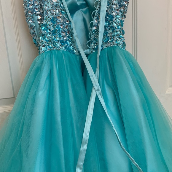 Hombre turquoise Tween party dress. Hombre turquoise Tween party dress.